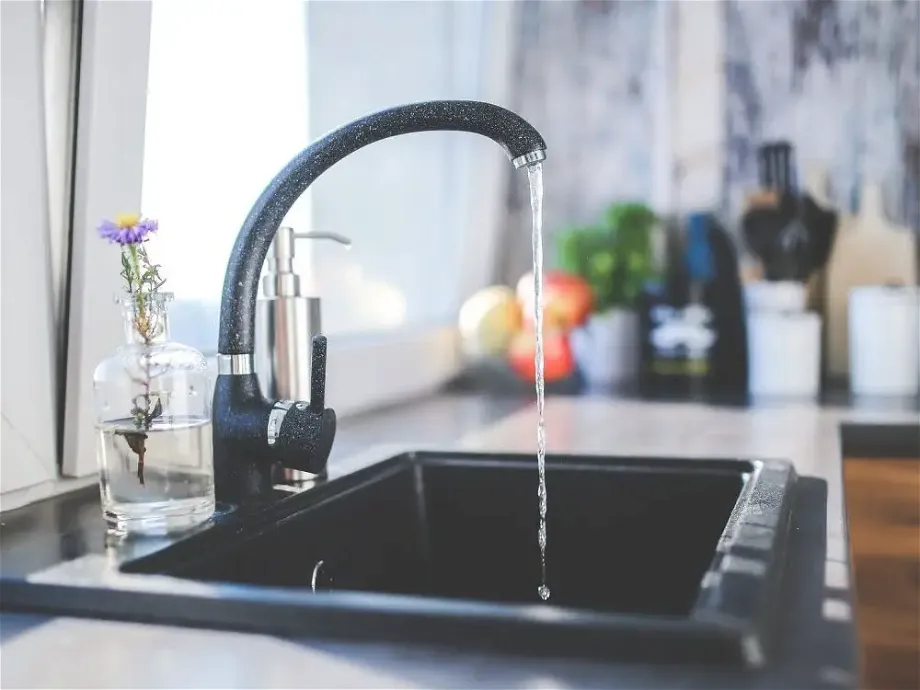 running faucet in the kitchen