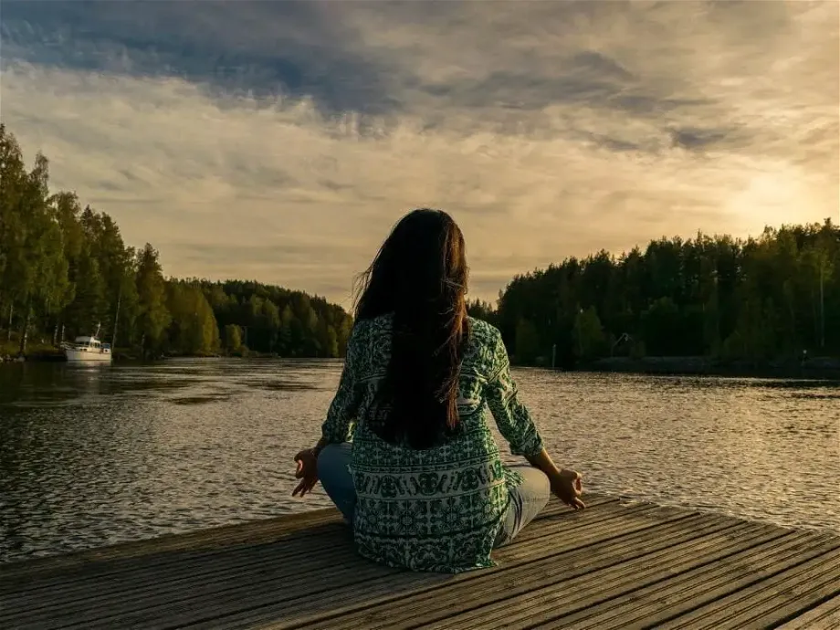 a woman meditates