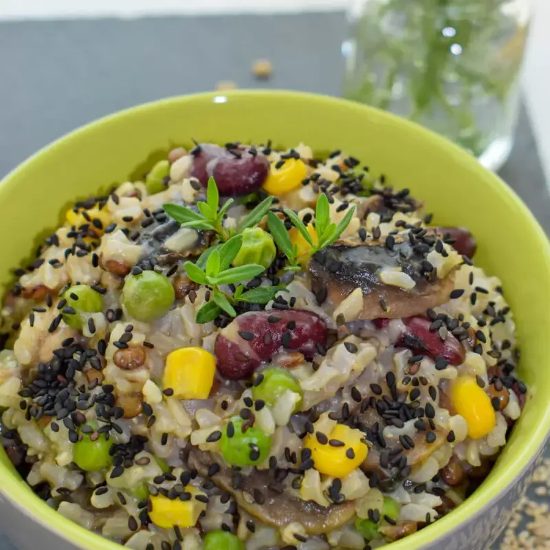 ¾ view of a bowl full of brown rice rissotto