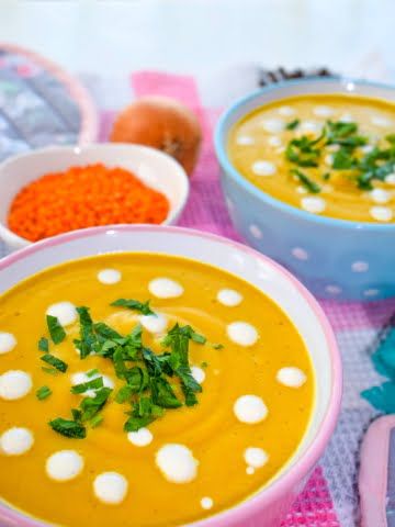 a bowl full of vegan red lentils cream soup ¾ shot