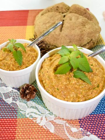 two bowls of vegan cashew and veggie spread ¾ view
