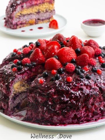 Super juicy and fresh whole plant foods cake. No sugar and no oil! It is filled with fresh fruits and layered with this fantastic, creamy blueberry frosting! All this covered with the tastiest blueberry topping ever! This cake is a perfect dessert for any occasion or whenever you need something sweet and healthy!