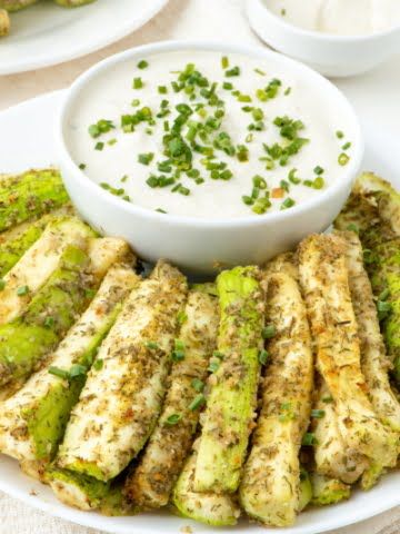 Zucchini Sticks with a cup of sunflower seeds sauce