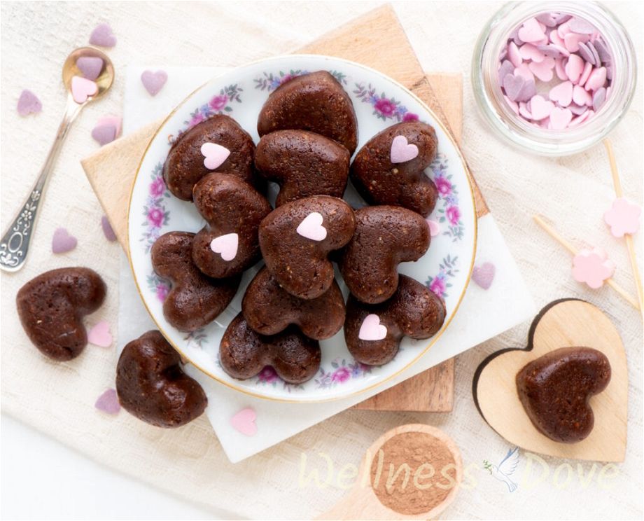an overhead view of the healthy vegan brownie hearts in a small plate