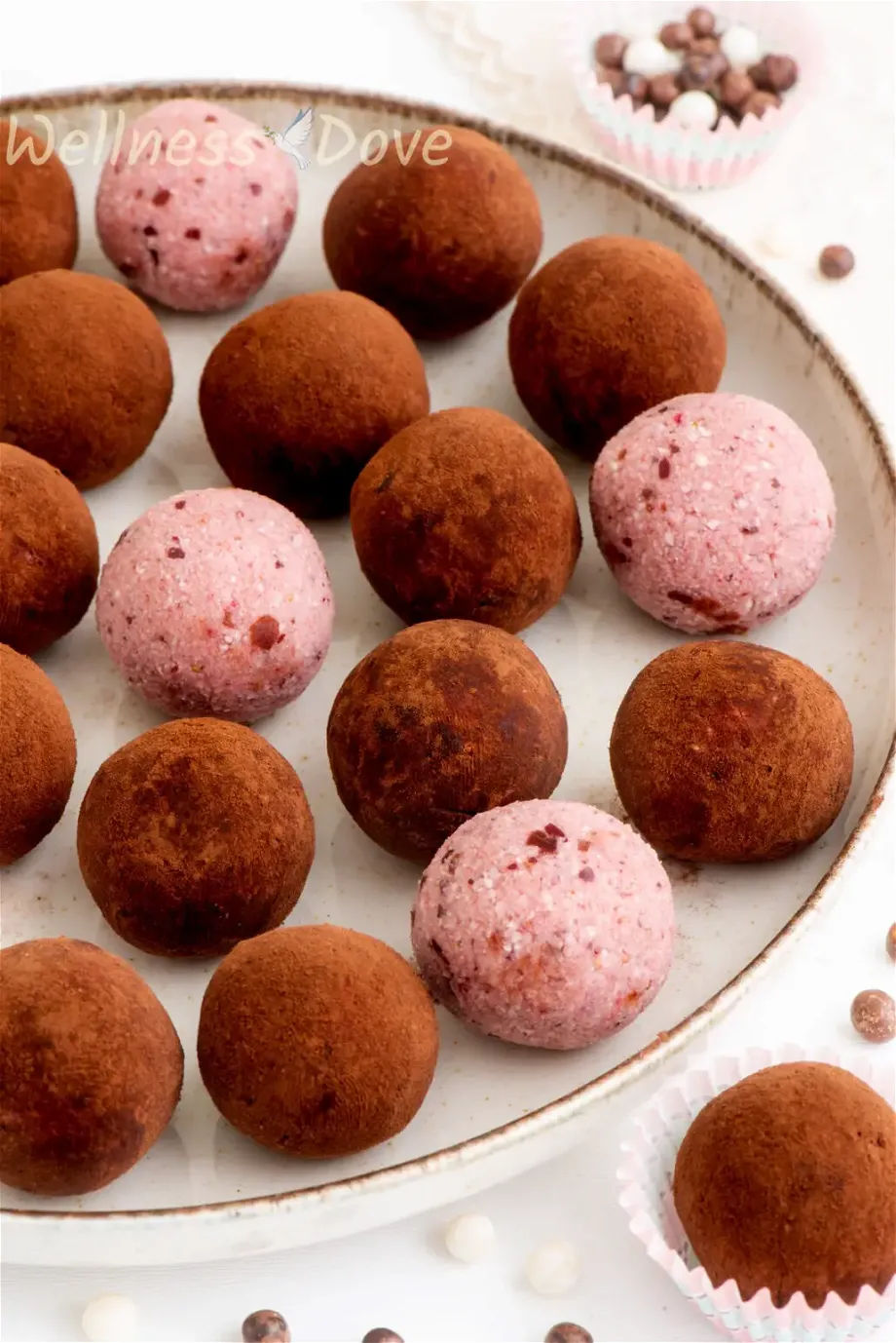 the strawberry vegan truffles in a large plate
