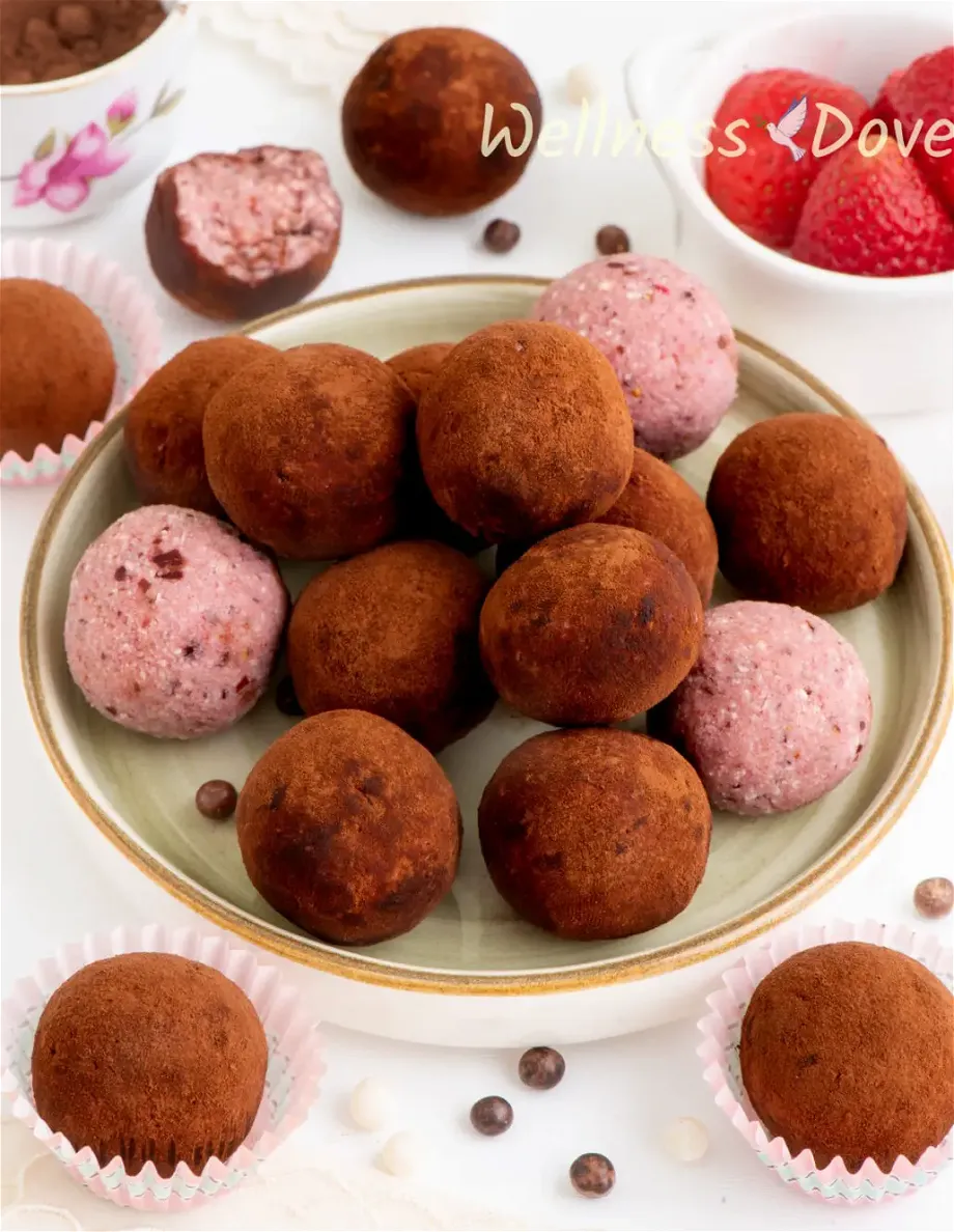 the strawberry vegan truffles in a small plate - 3/4 view