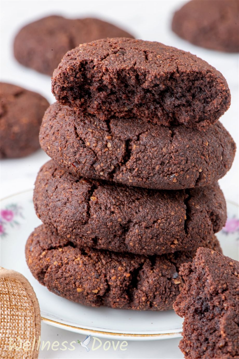 The Easy Chocolate Almond Vegan Cookies on a small plate, front view.
