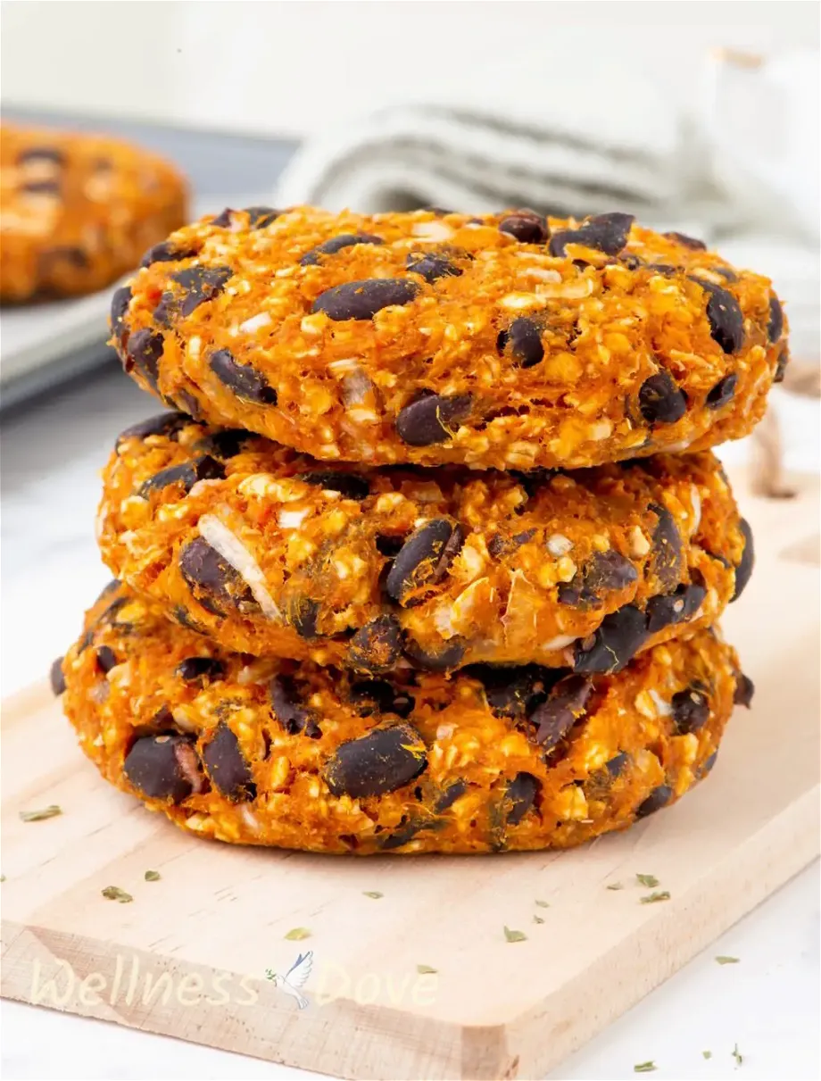 three of the Sweet Potato Black Bean Burgers stacked on top of each other