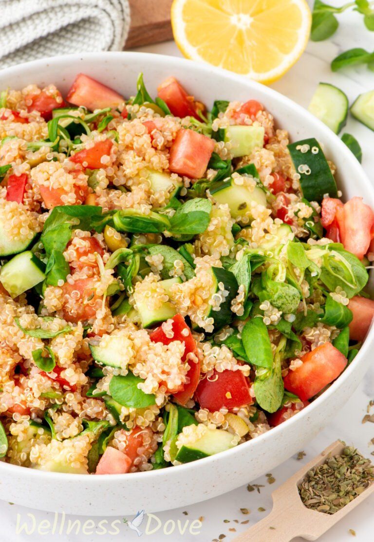 a close u 3/4 photo of the easy quinoa vegan summer salad in a bowl