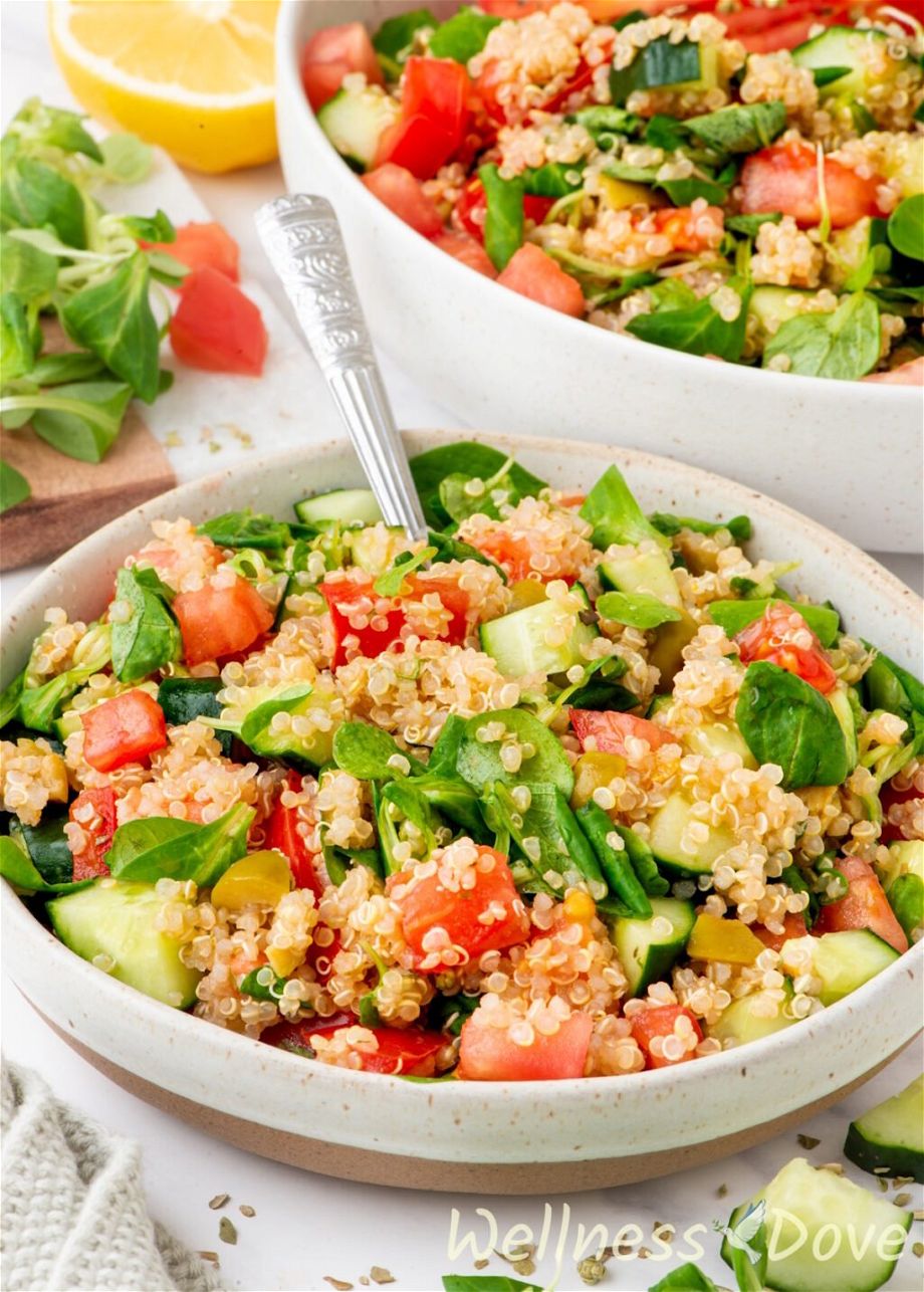 a lower 3/4 shot of the easy quinoa vegan summer salad in a small bowl