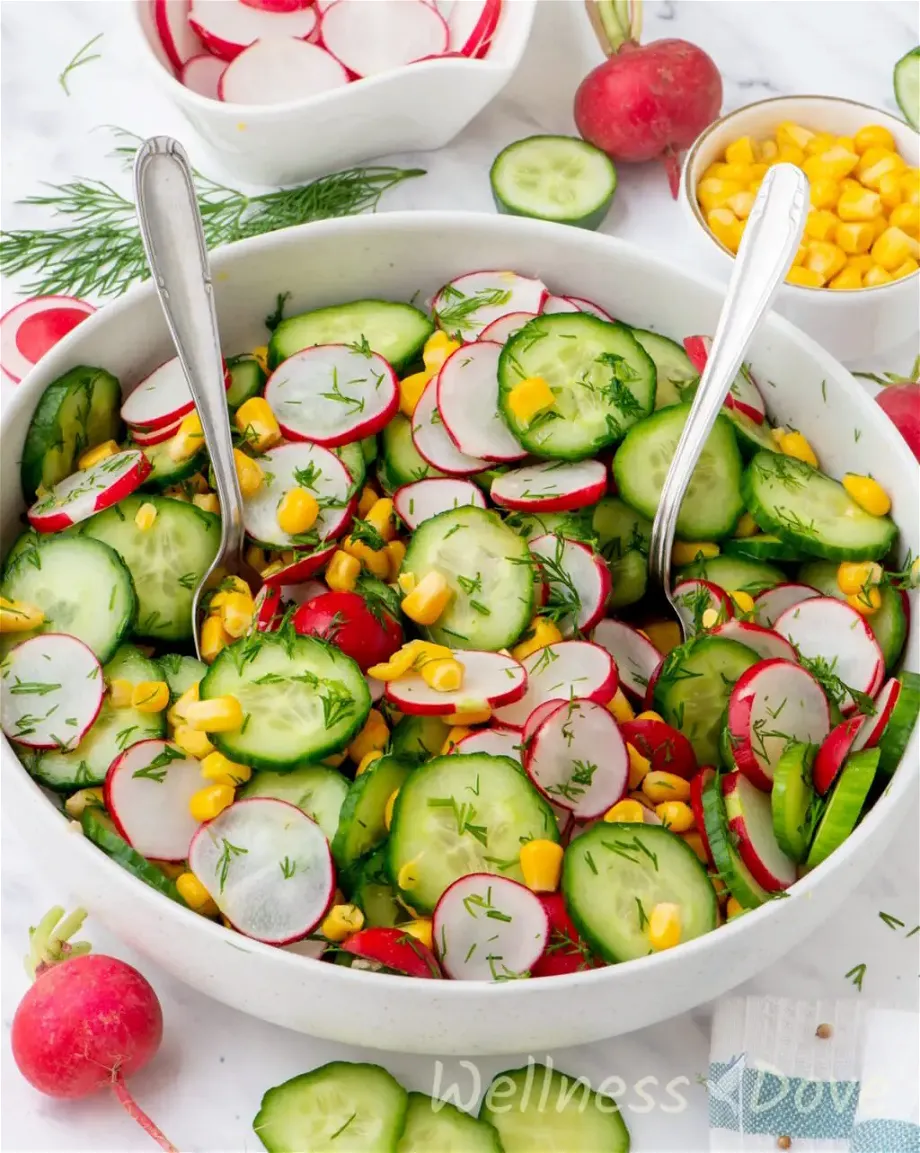a 3/4 angle of the Fresh Cucumber Summer Vegan Salad in a large bowl