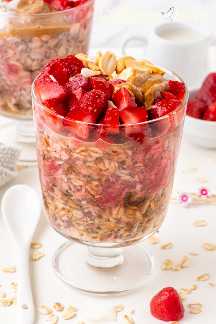 the Easy Overnight Oats with Strawberries in a glass, shot from the side