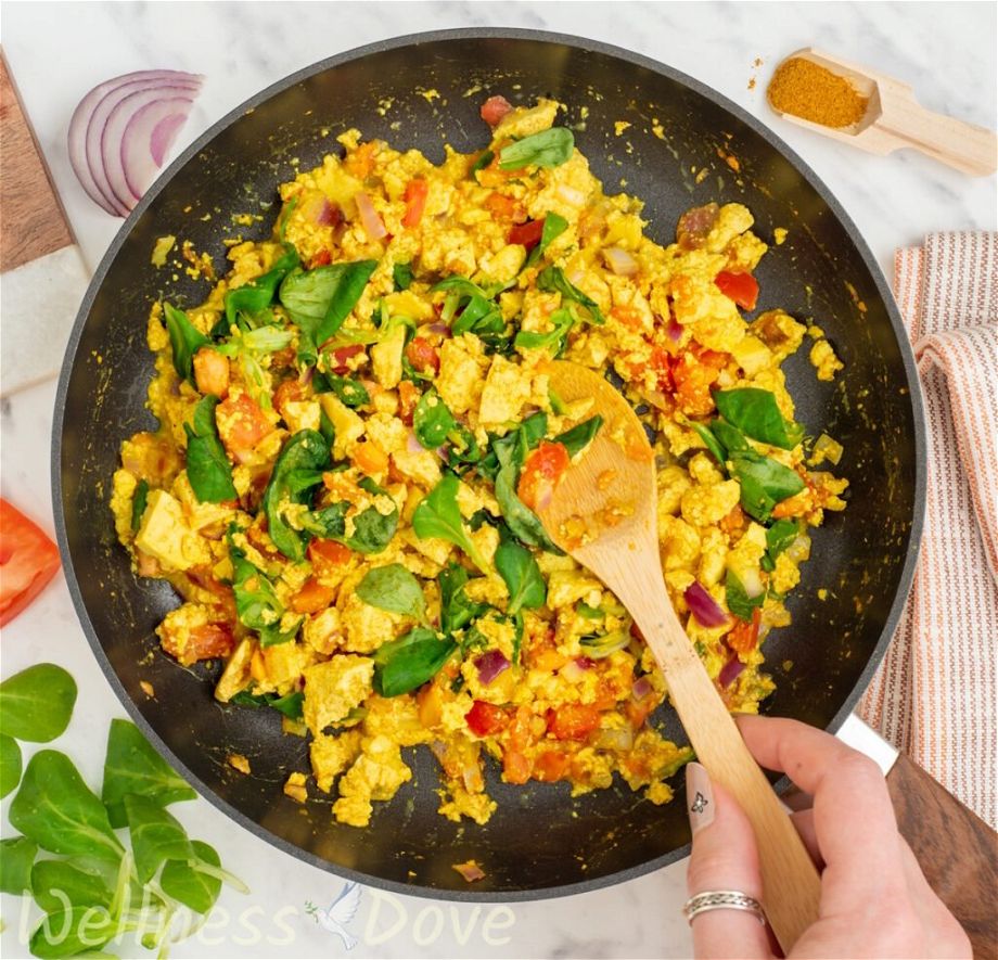 an overhead photo of the quick curried tofu vegan egg scramble in a pan