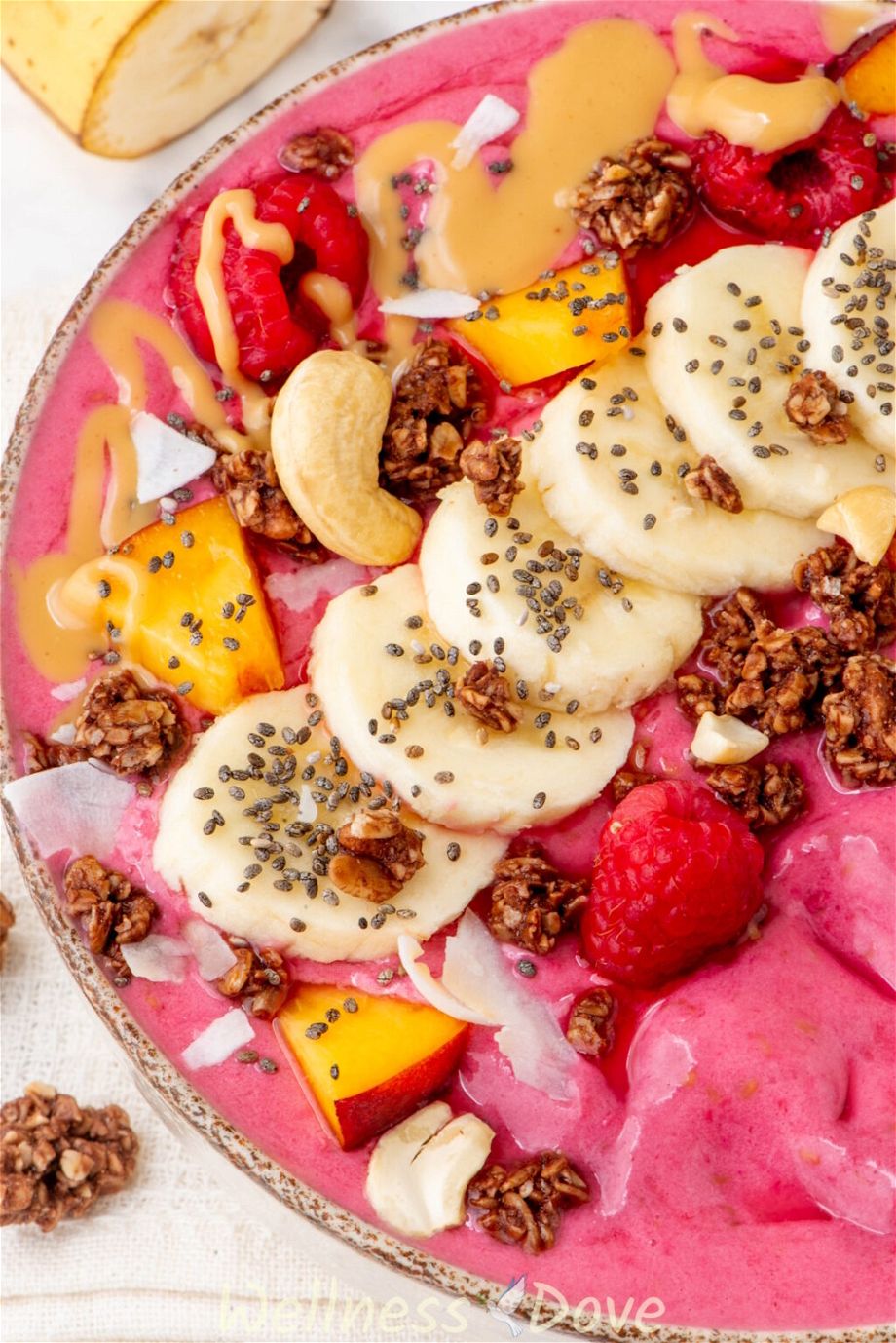 a very macro photo of the Raspberry Banana Vegan Smoothie Bowl