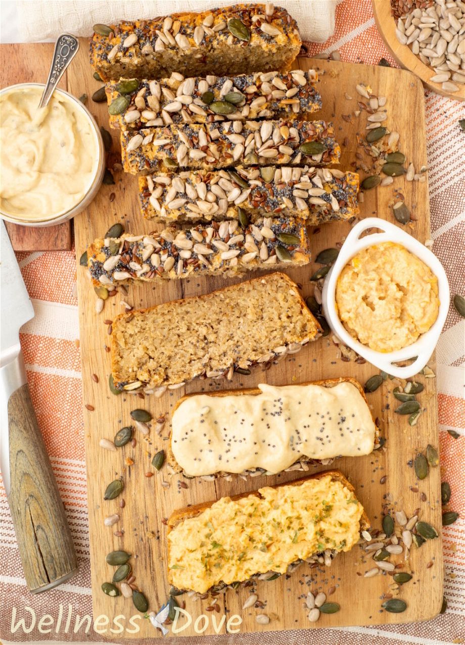 overhead photo of the Easy No Yeast Gluten free Vegan Quinoa Bread - slice and some of the slices are topped with hummus