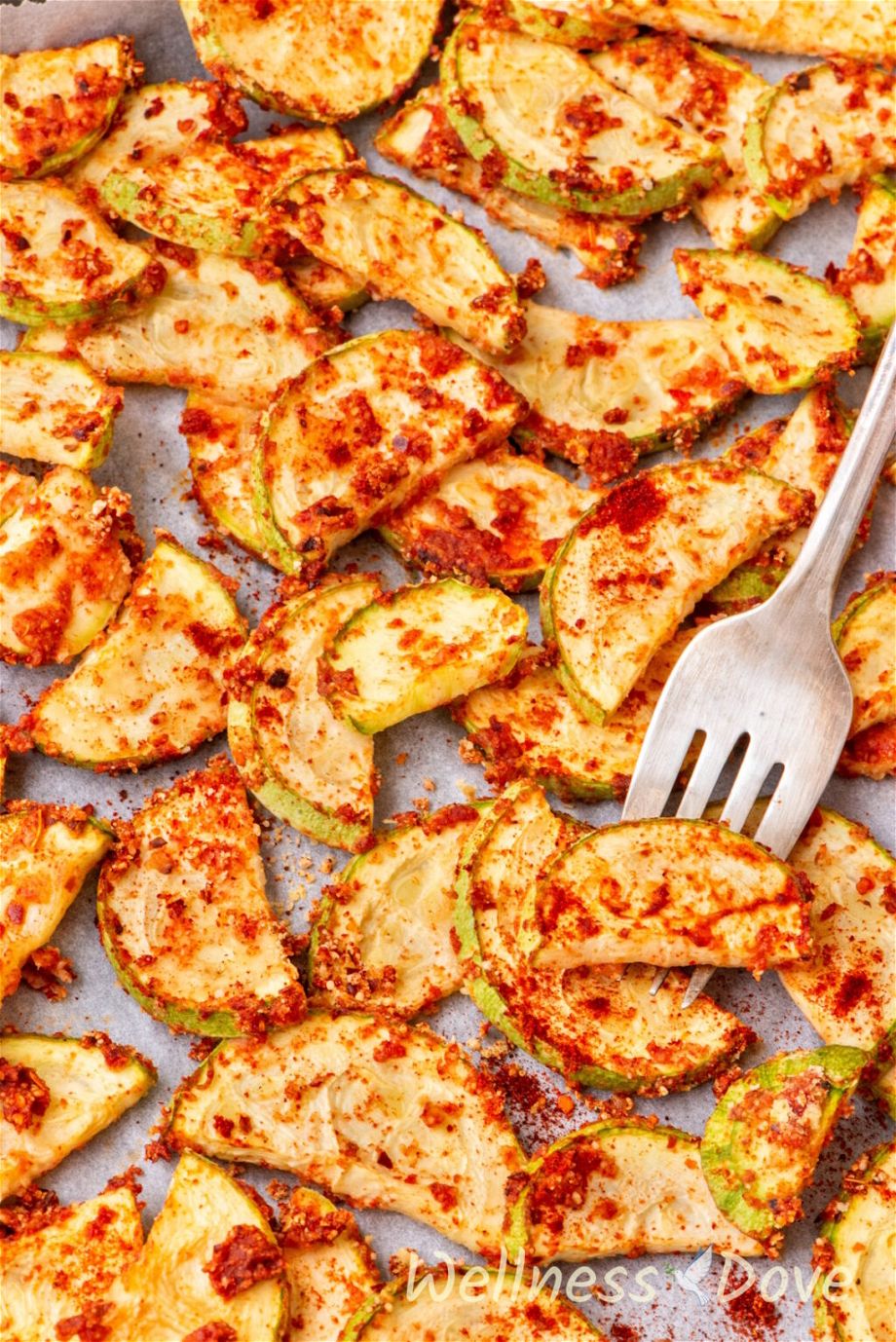 close up shot of the Easy Oil-free Vegan Baked Zucchini while still in the baking tray
