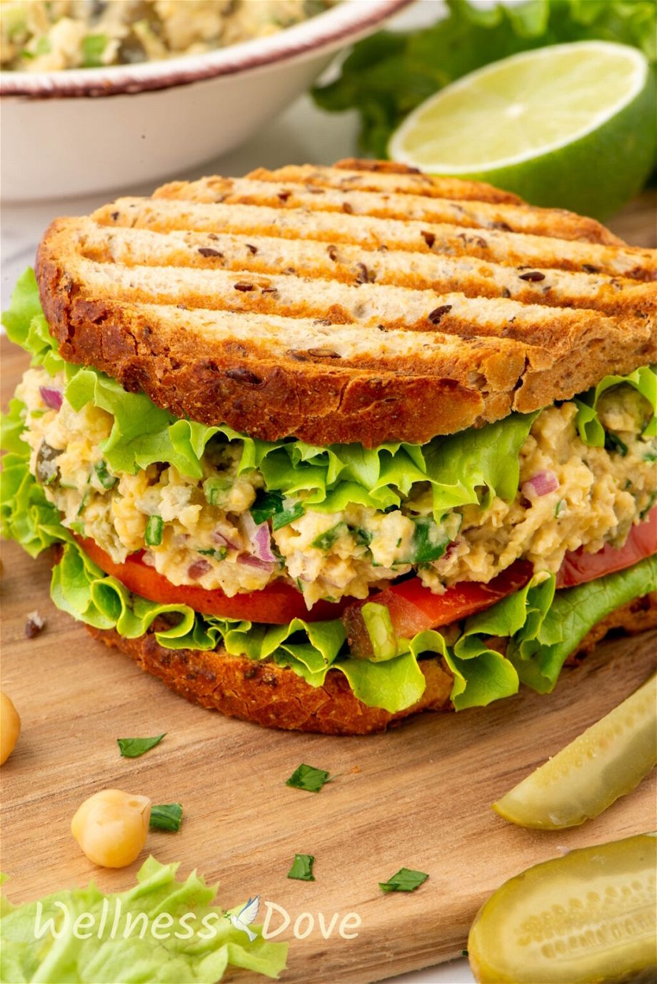 a very close up shot of the Healthy Vegan Chickpea ‘Tuna’ Salad in a sandwich