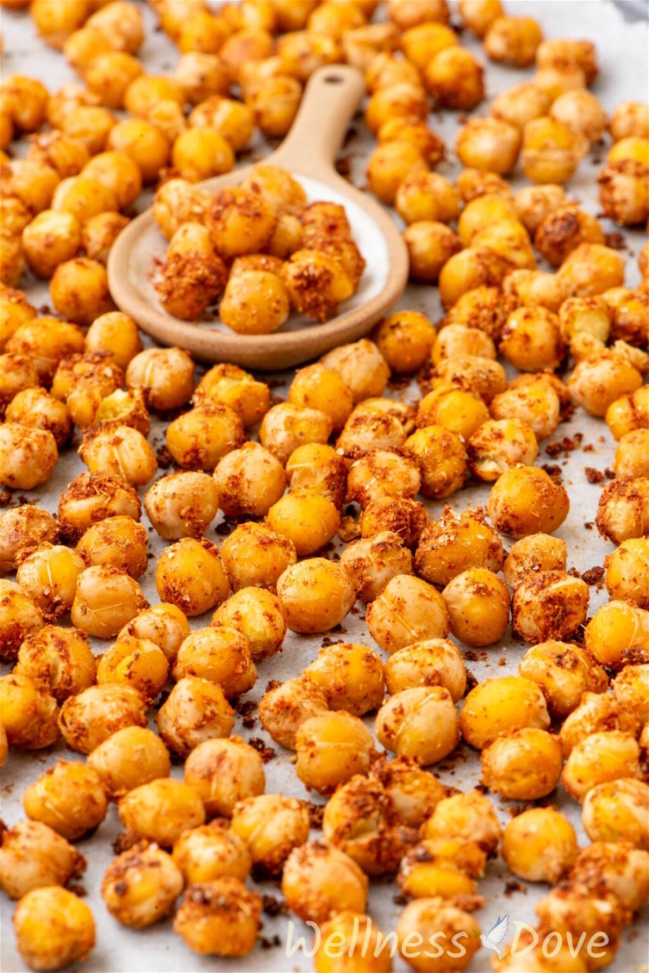 a close up photo of the Oil-free Oven Roasted Chickpeas in a baking tray