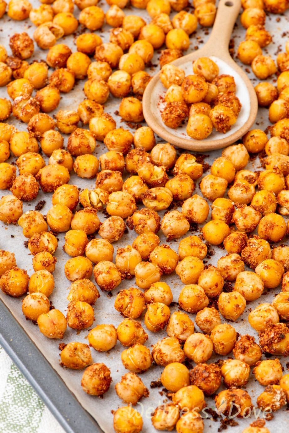 a 3/4 angled photo of the Oil-free Oven Roasted Chickpeas in a baking tray