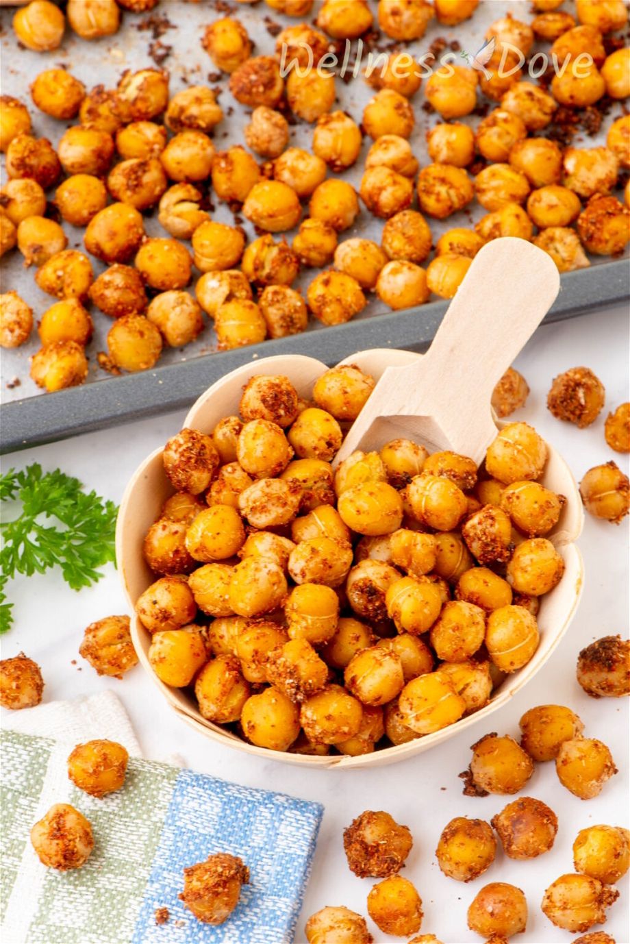 the Oil-free Oven Roasted Chickpeas in a small wooden cup