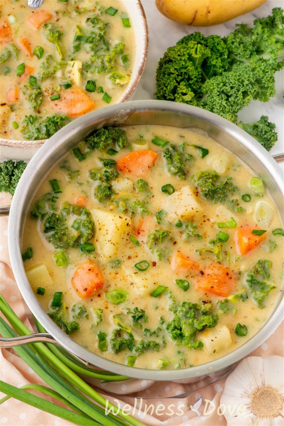 the Creamy Kale Potato Vegan Soup in a small pot