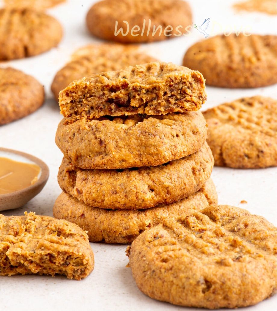 a macro shor of the Easy and Healthy Peanut Butter Vegan Cookies, 4 of them are stacked on top of each other. 