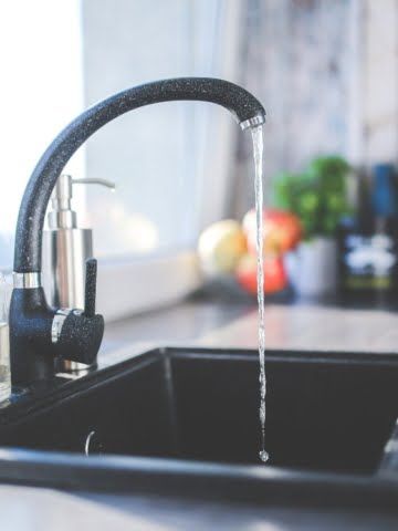 running faucet in the kitchen