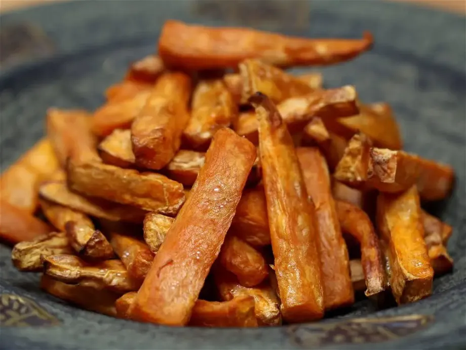 a plate with baked sweet potatoes