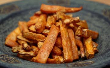 a plate with baked sweet potatoes