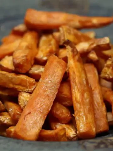 a plate with baked sweet potatoes