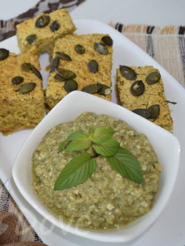 a ¾ shot of a bowl full of eggplant dip