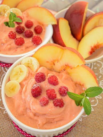 a bowl of vegan peachy sorbet ¾ view