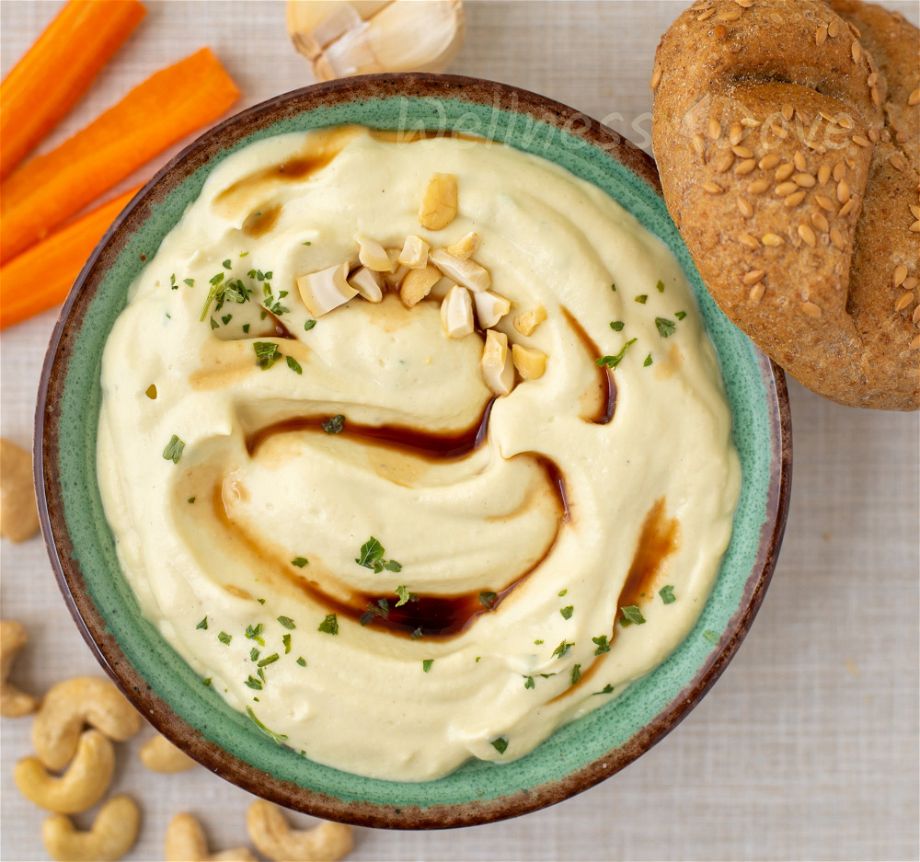 the vegan dip, topped with cashews and soy sauce, macro and overhead view