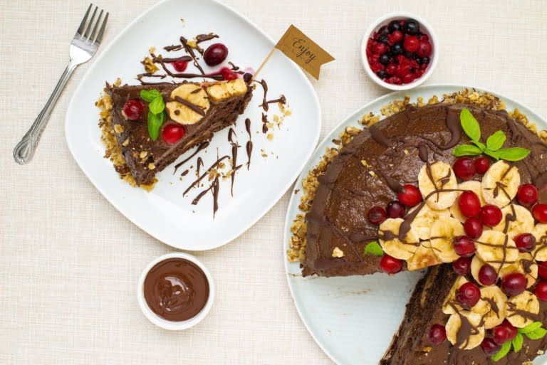 Cut cake and a piece, overhead view