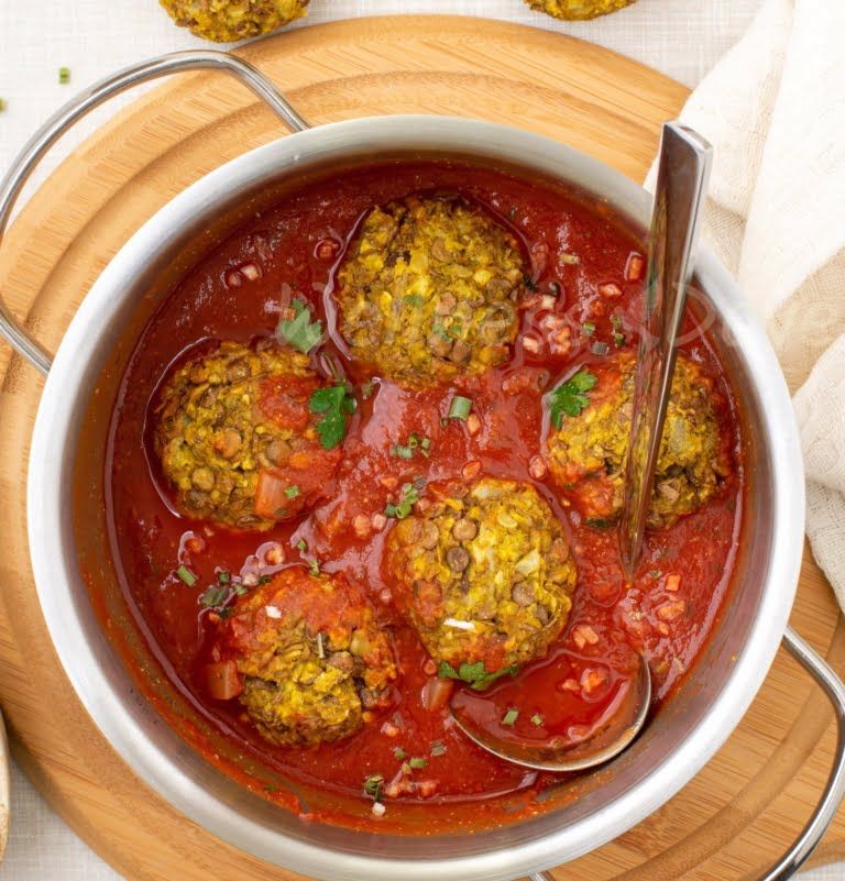 vegan lentil meatballs in a pot, overhead view