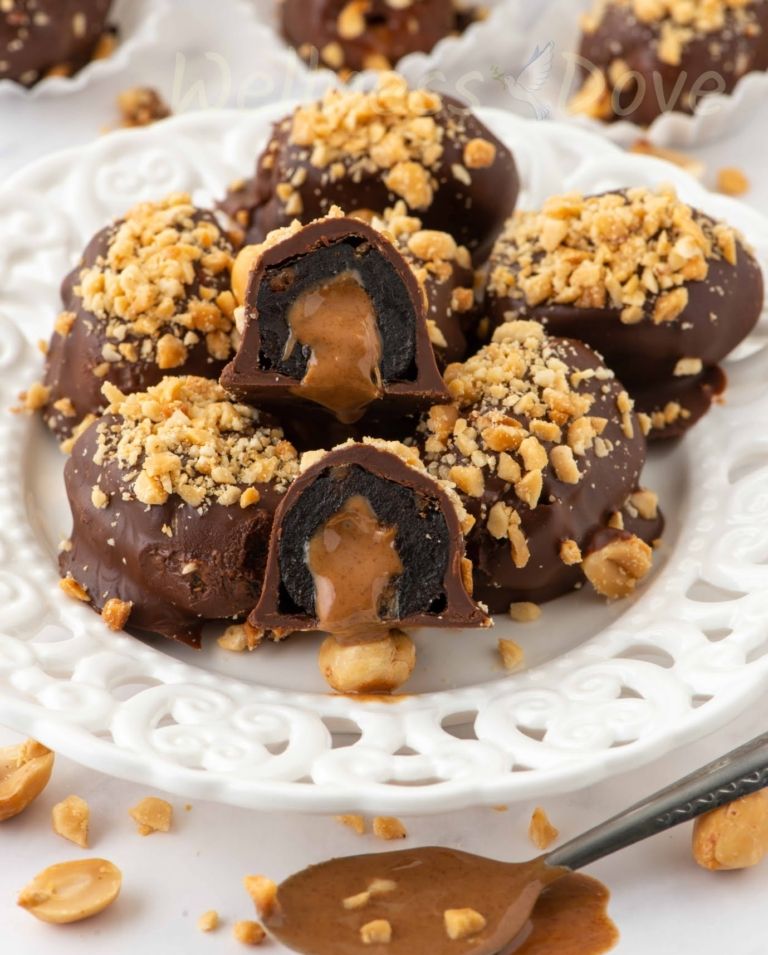 vegan mini snickers front view on a plate, cut