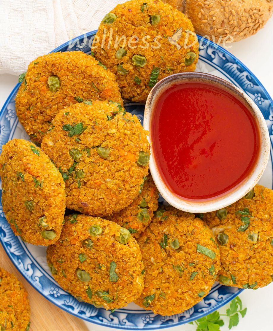 the vegan burger patties on a plate with some sauce