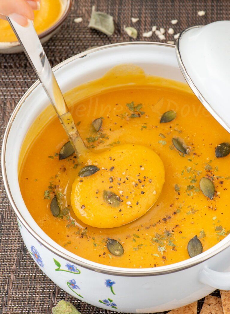 a pot with parsnip soup with a laddle inside