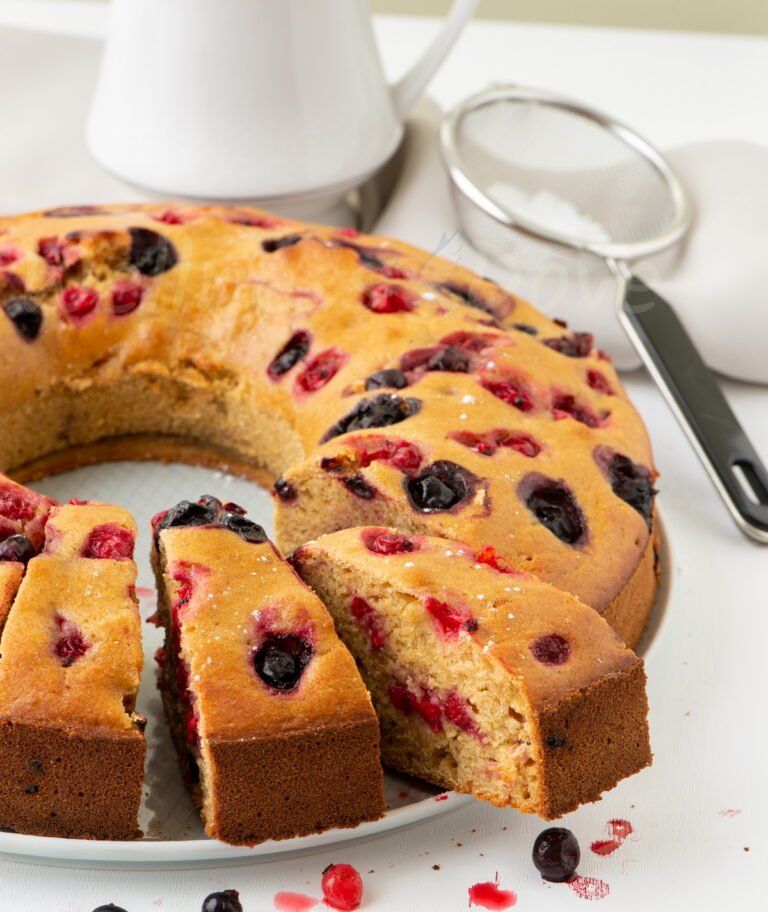 Macro view of the vegan bundt cake, with some pieces pulled