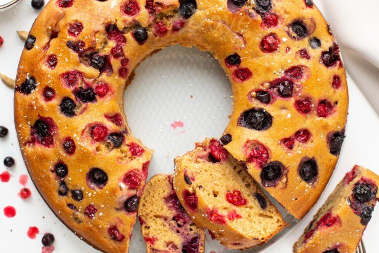 overhead view of the bundt cake, with some piece pulled away 