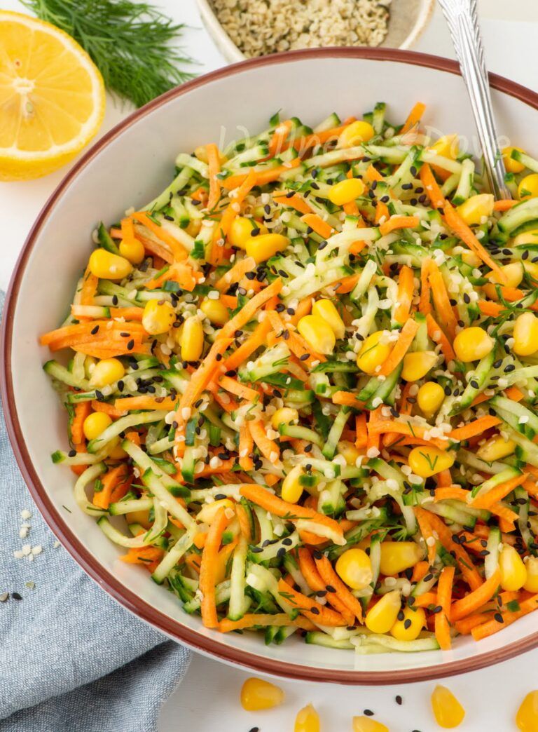 a bowl of fresh cucumber carrot salad