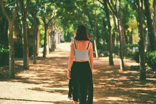 Woman walking in a park