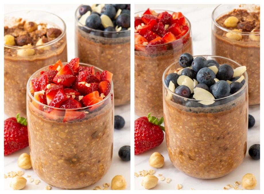 two glasses of vegan overnight oats, one with strawberries, one with blueberries