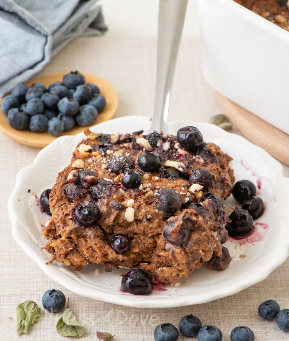 a serving of ovenbaked oatmeal with blueberries on a plate