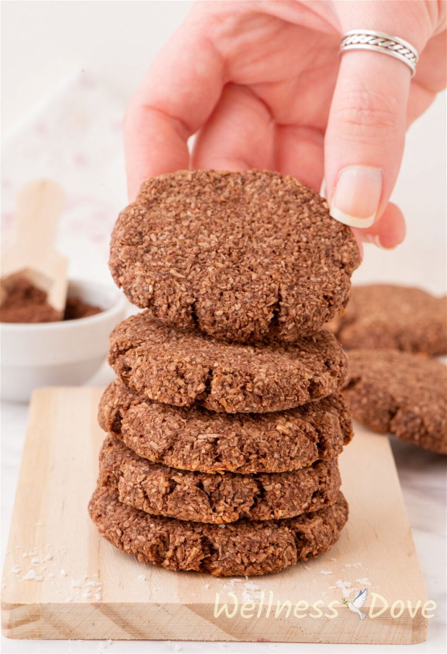 the easy 3 ingredient vegan coconut cookies stack on top of one another