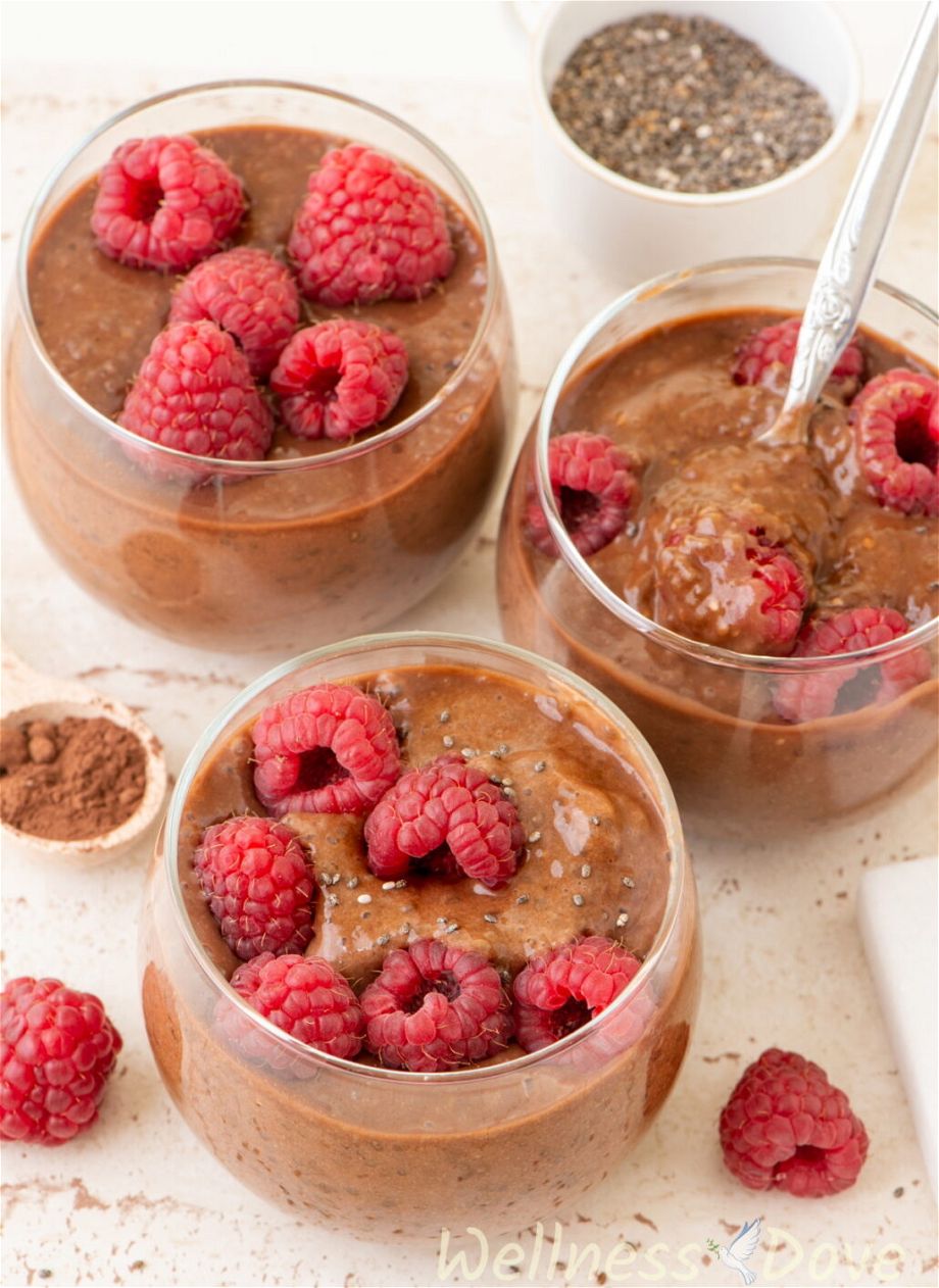 3 cups filled with easy vegan chocolate chia seeds pudding 