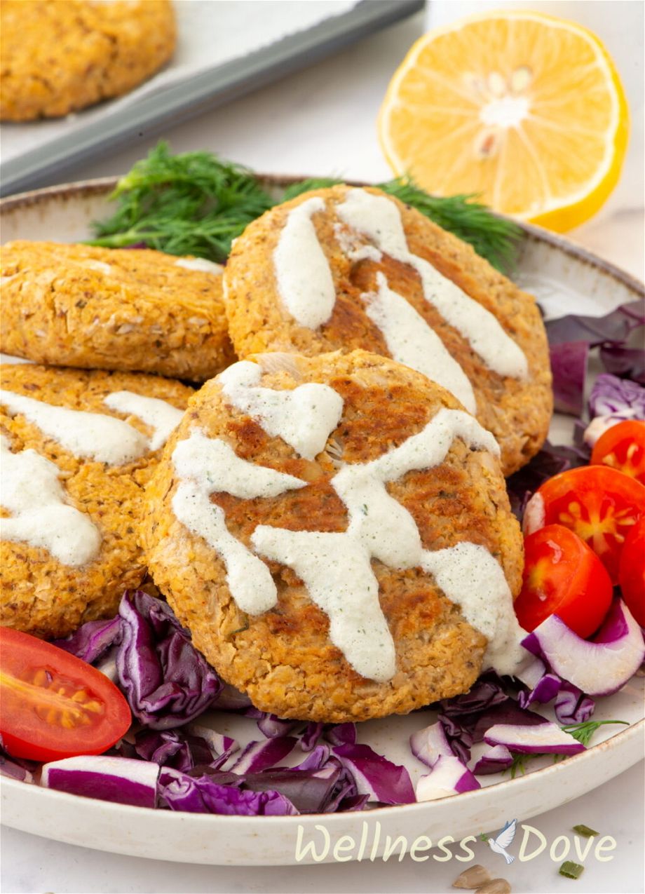 the the easy vegan sunflower seeds sauce  over some cauliflower vegan patties