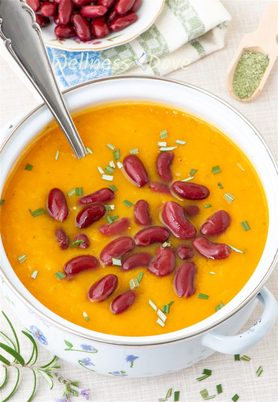 The easy, healthy, and creamy butternut squash vegan soup in a pot, 3/4 view