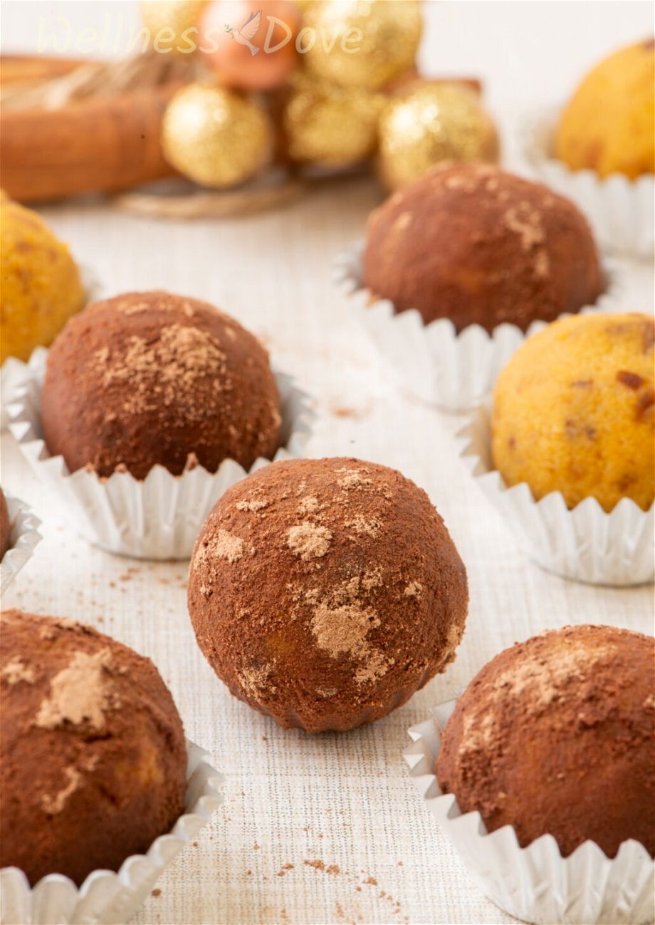 a close up of the easy vegan pumpkin truffles