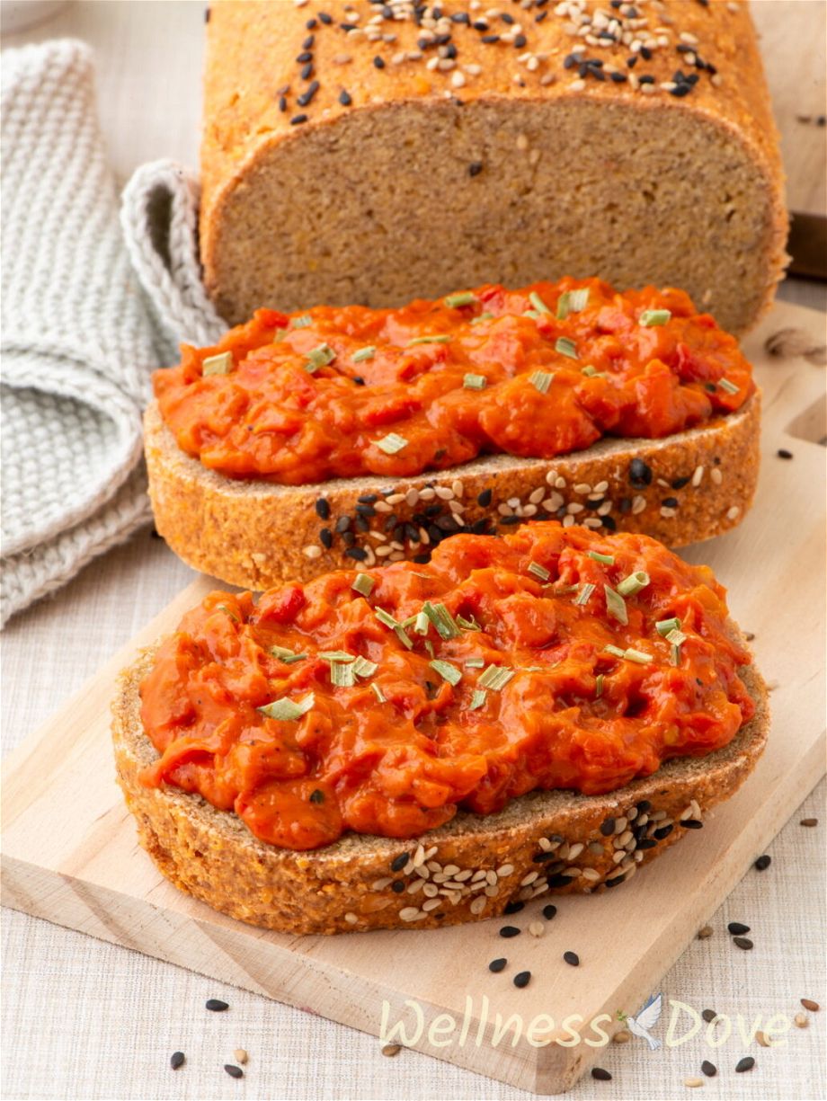 two slices of the vegan gluten free lentil bread, covered with spread